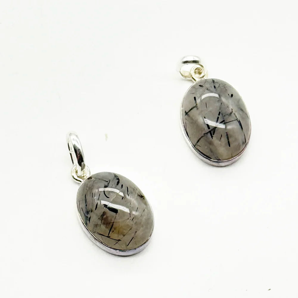 Quartz Pendant with Tourmaline