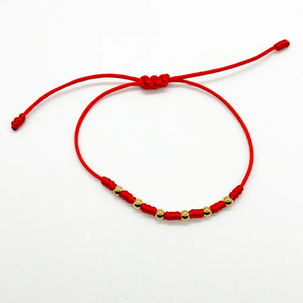 Pulsera roja 7 nudos y el Trébol de la suerte