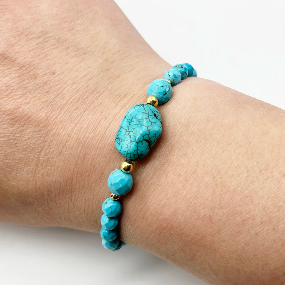 Pulsera dorada con Turquesas