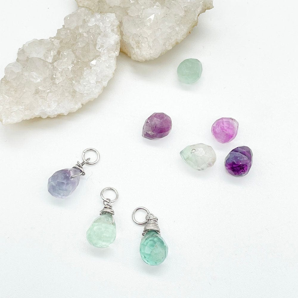 lágrimas de fluorita, lágrimas de plata y mineral, piedras preciosas, piedras y sus beneficios, joyeria artesana, plata y minerales, joyas, colgantes de piedras