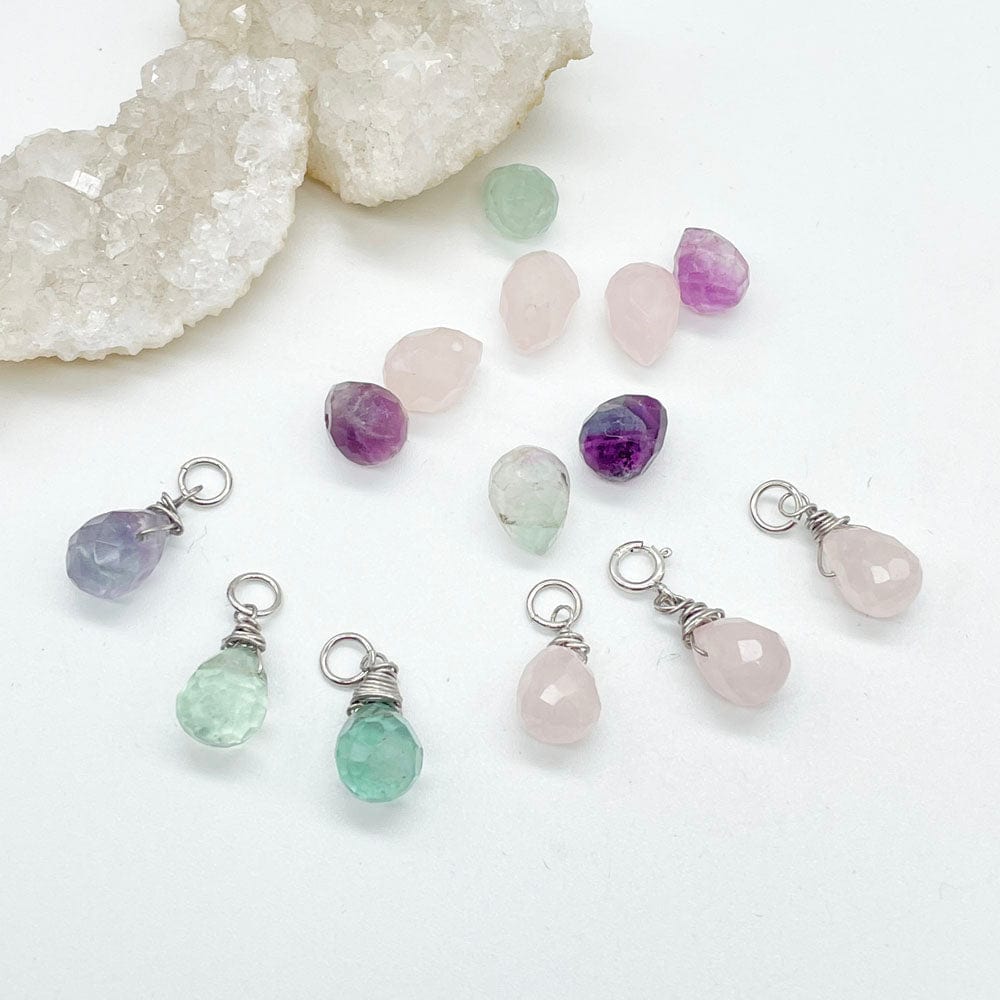 lágrimas de fluorita, lágrimas de plata y mineral, piedras preciosas, piedras y sus beneficios, joyeria artesana, plata y minerales, joyas, colgantes de piedras, cuarzo rosa