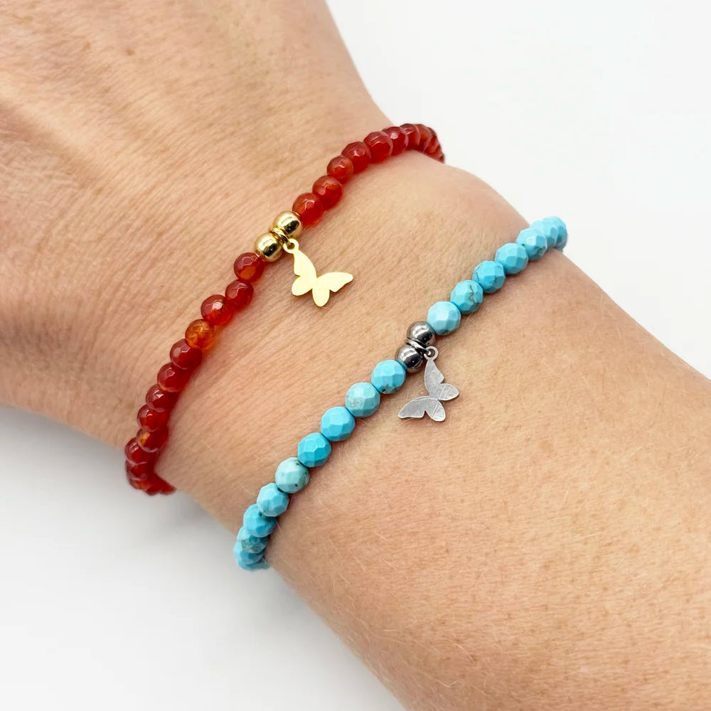 Pulsera de Minerales y una Mariposa