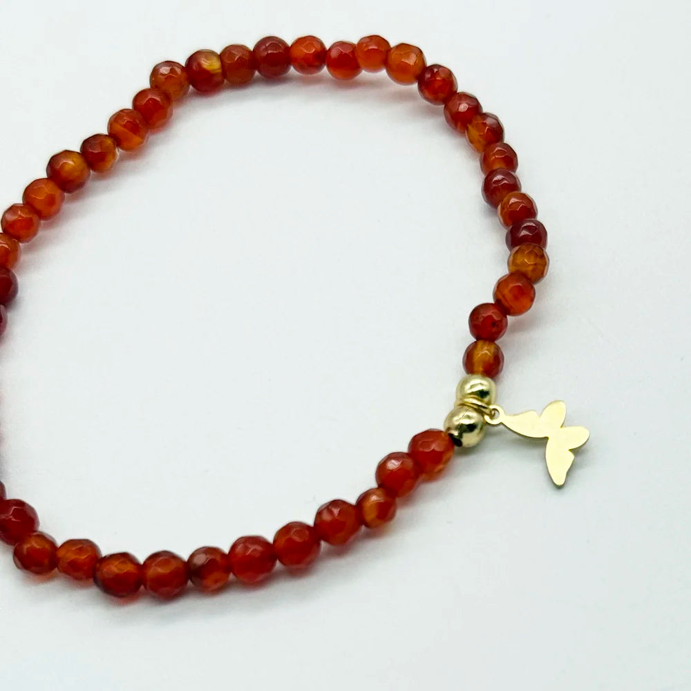 Pulsera de Minerales y una Mariposa