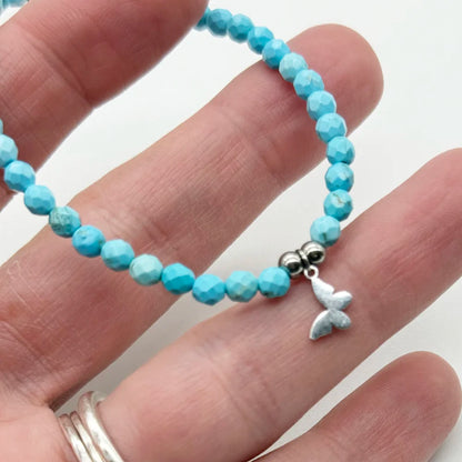 Pulsera de Minerales y una Mariposa