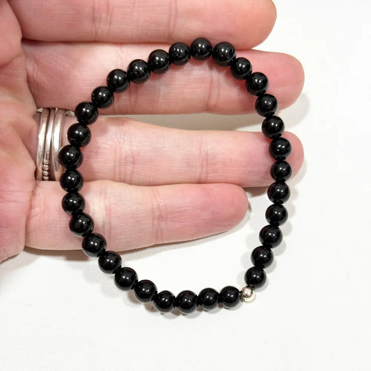 Pulsera de bolitas de turmalina negra natural para protecció