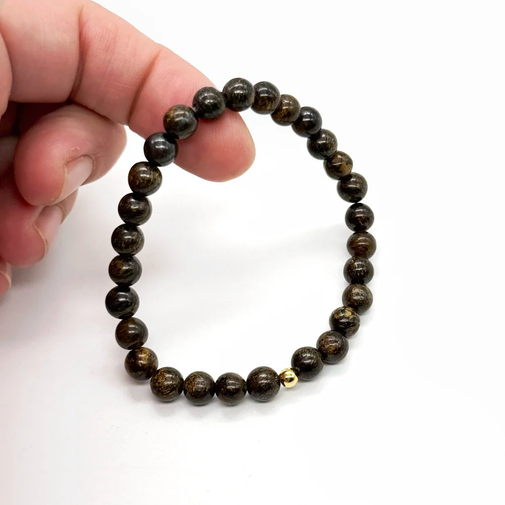 Pulsera de broncita natural con bolas lisas de 6 mm