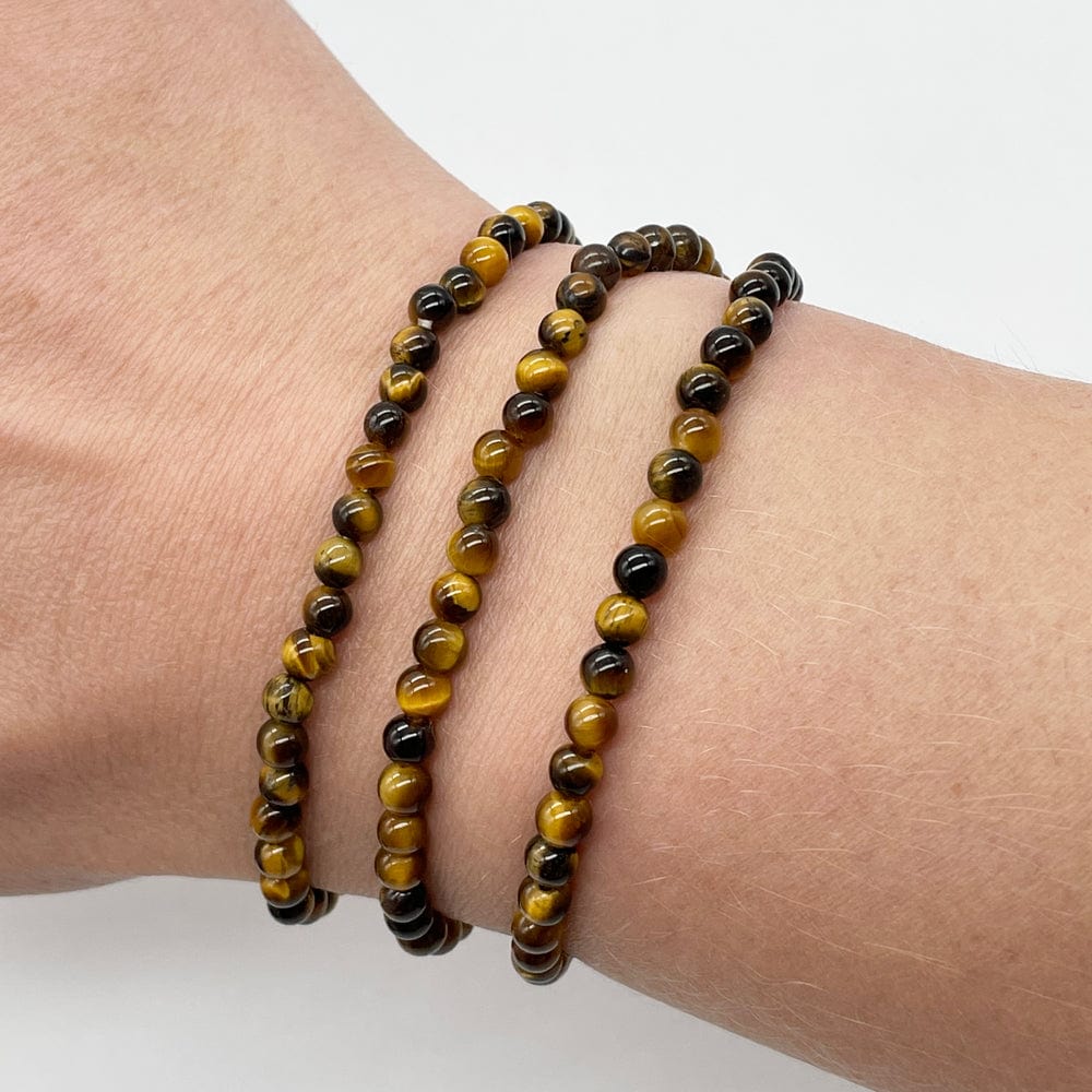 Pulseras de ojo de tigre natural hecha a mano. Diseño elástico con plata 925, ideal para protección, fuerza interior y equilibrio diario.