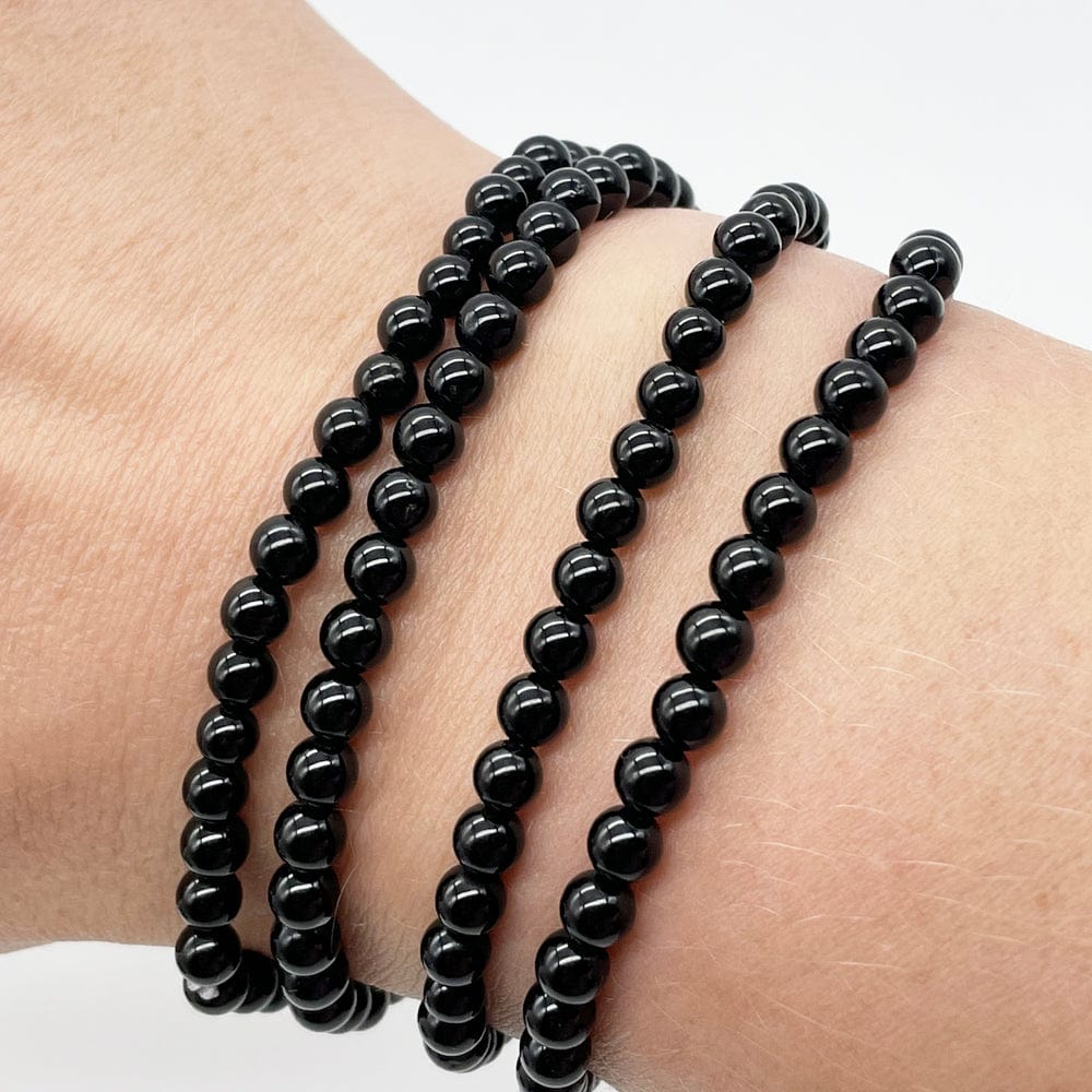 Pulsera de bolitas de turmalina negra natural para protección